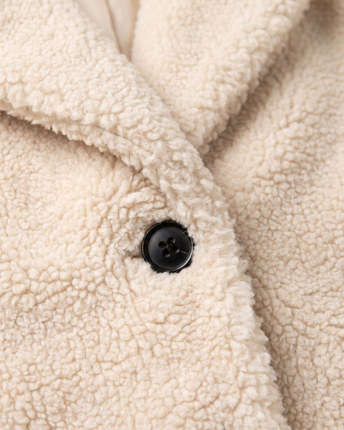 Long Teddy Winter Coat With Notch Lapels - close-up detail (Cream Apricot)