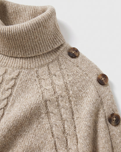 Cable Knit Turtleneck Poncho Sweater With Button Shoulders - close-up detail (Khaki Oatmeal)