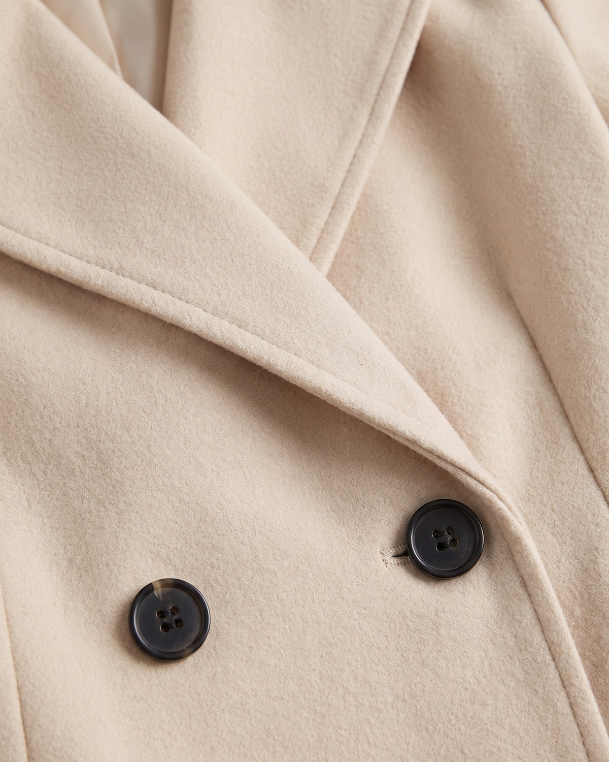 Double Breasted Long Pea Coat With Notch Lapels - close-up detail (Cream Ivory)