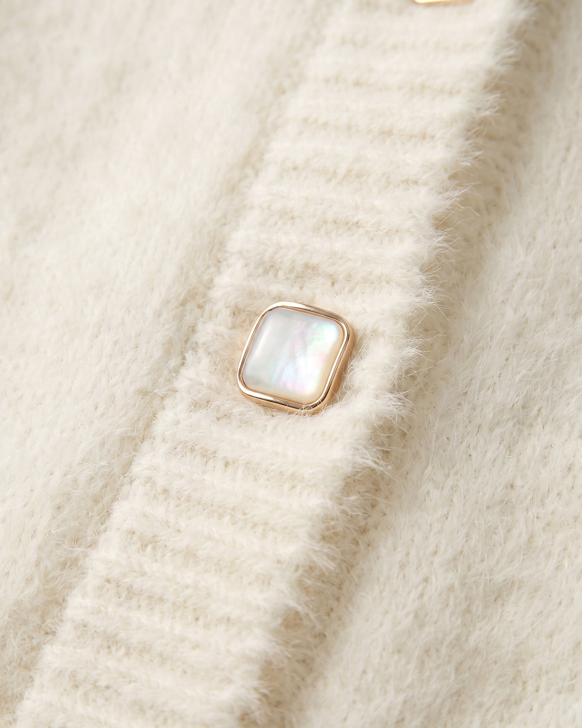 Fuzzy V Neck Short Cardigan Sweater With Pockets - close-up detail (Off-white)