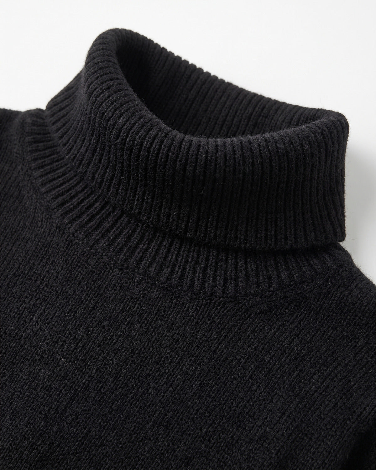 Oversized Knit Turtleneck Sweater With Side Slits - close-up detail (Black)