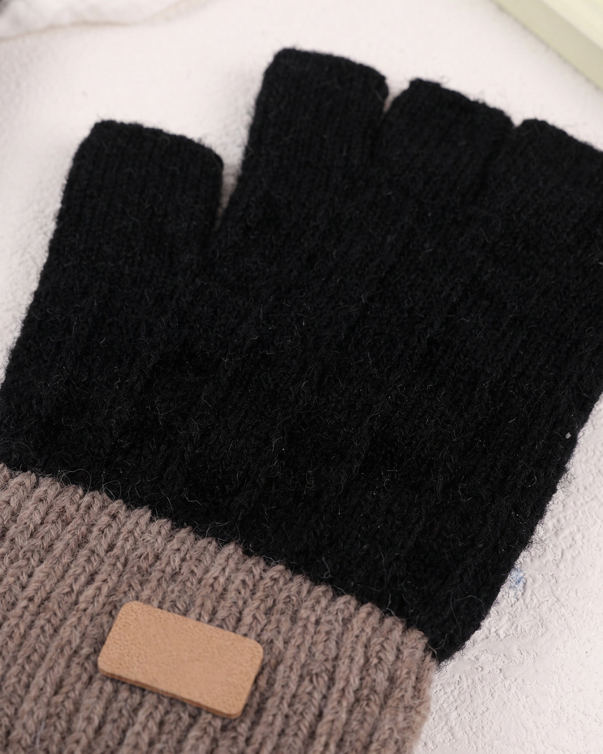 Two Tone Knit Fingerless Gloves With Ribbed Cuff - close-up detail (Black With Taupe Cuff)